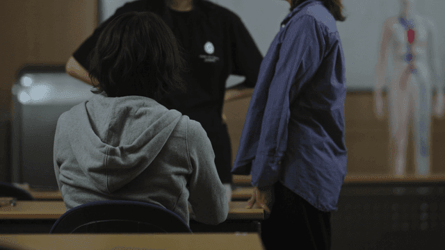 Students talking in classroom
