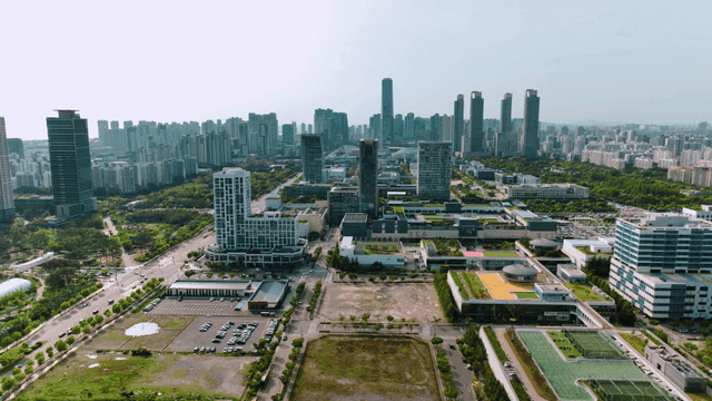 Modern city with high-rise buildings and green spaces