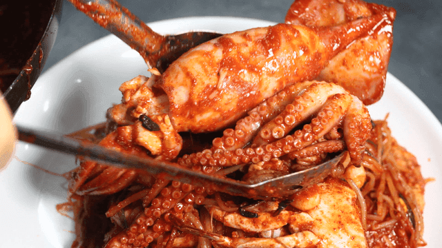 Plate full of spicy steamed seafood