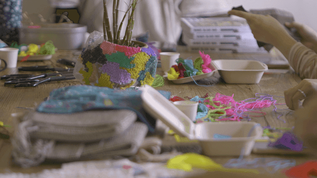 Craftspeople who make things with colorful threads