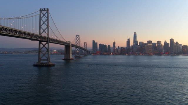 Sunset view of the bridge and city skyline