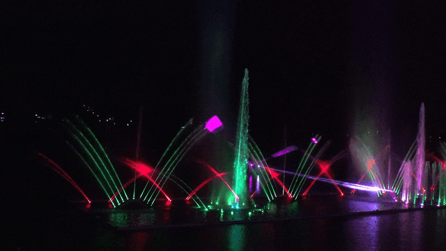 Colorful fountain show at night
