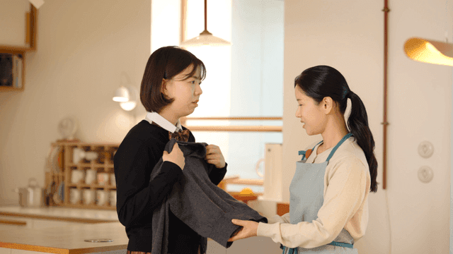 High school daughter complains to her mother about doing laundry at home.