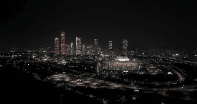 Night view of a city with skyscrapers