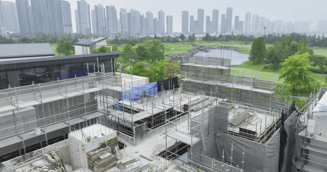 Construction site with city skyline