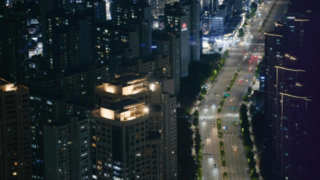 Night view of a bustling city with traffic