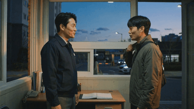 Security guard and resident talking in security office