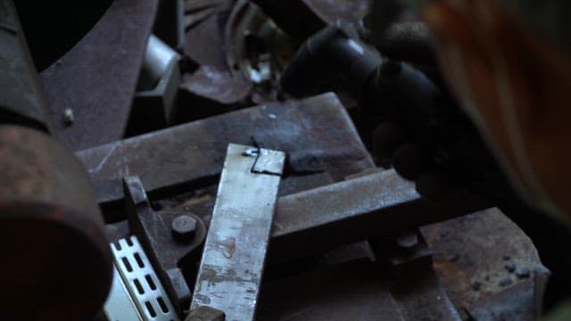 Metal being welded with sparks flying