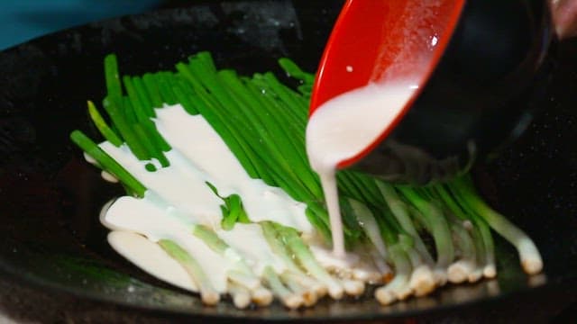 Korean pancake with green onions and seafood