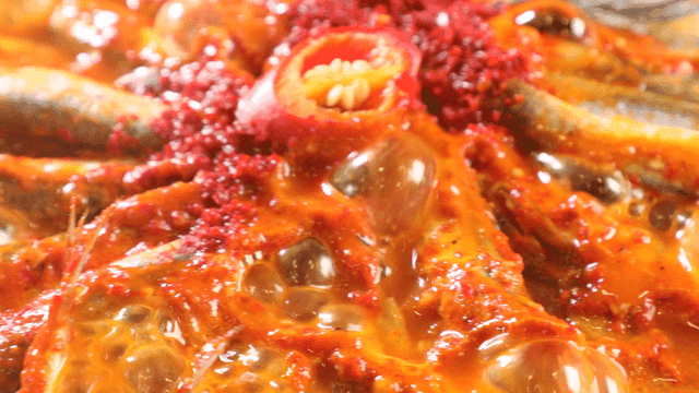Spicy anchovy stew bubbling and boiling in pot