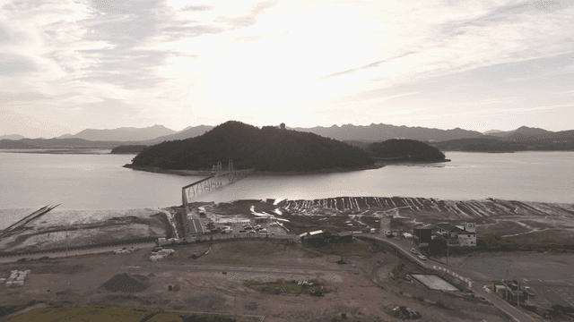 Coastal village with bridge and sea
