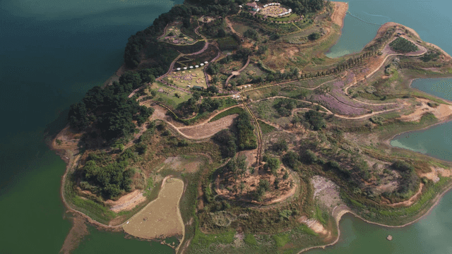 Blue island surrounded by lake