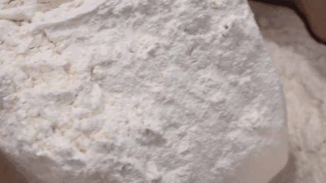 White flour filled in scoop