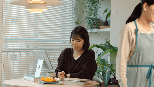 Mother cheering on her daughter's studies
