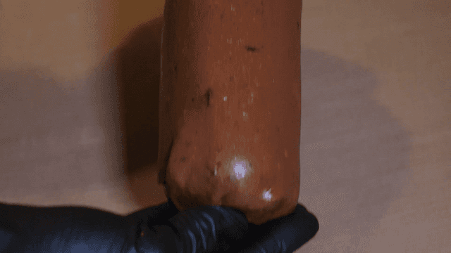 Hand holding chocolate marshmallow dough