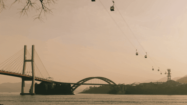 Bridge and cable car over wide sea