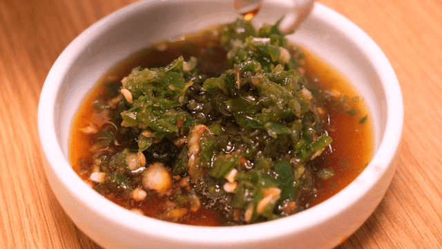 Soy sauce with chopped green peppers