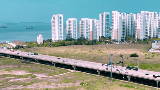 Coastal city with long bridge