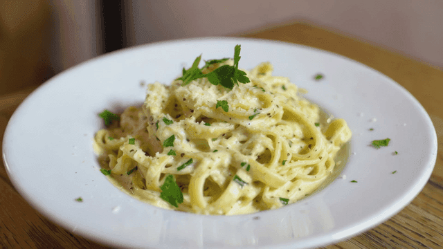 Creamy pasta garnished with parsley