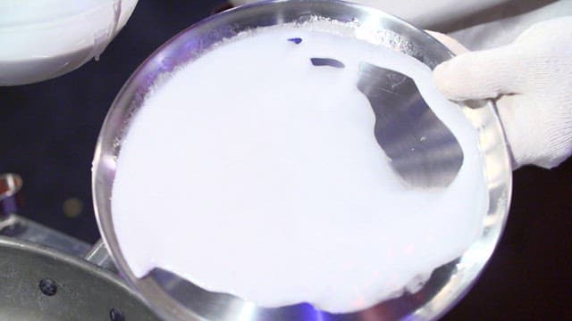 Starch batter pouring onto a tray