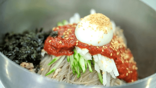 Spicy buckwheat noodles with egg and vegetables