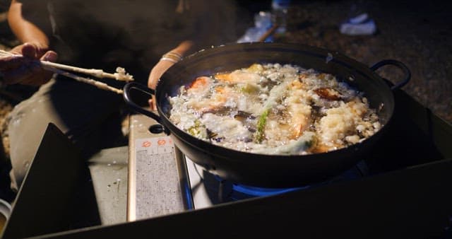 Evening Outdoor Cooking with a Portable Stove