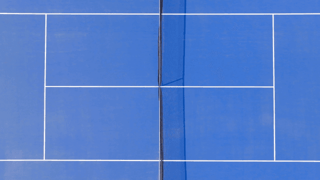 파란 테니스 코트의 항공 뷰