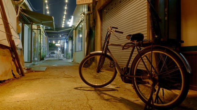 Quiet alley with a parked bicycle