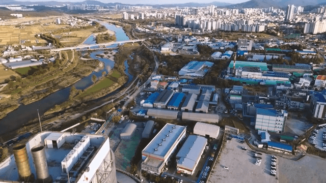 Cityscape with a control tower and river