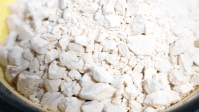 Bowl containing white zamid powder