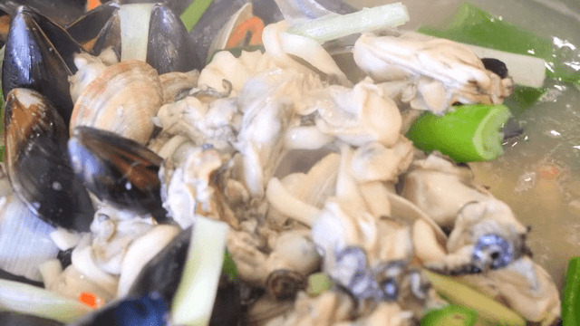 Oyster kalguksu with mussels and vegetables