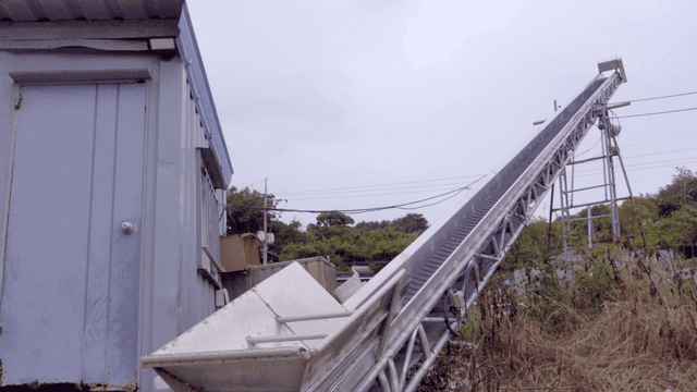 Conveyor belt installed at outdoor worksite