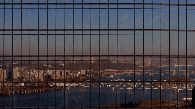 Cityscape reflected on a glass building
