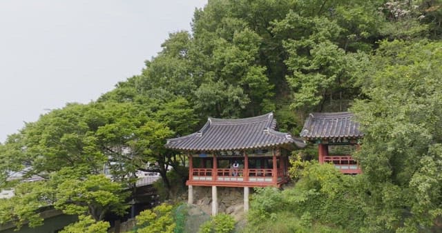 Traditional Korean pavilion by a riverside