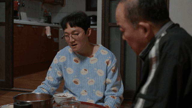 Two people having a meal together indoors