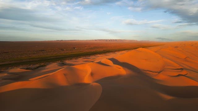 Vast desert landscape with sand dunes