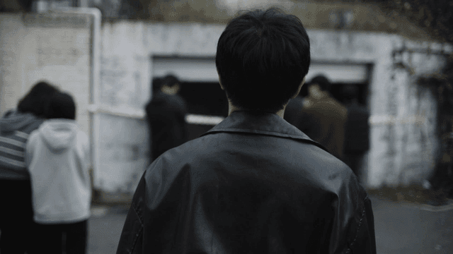 Back of man approaching no-trespassing line