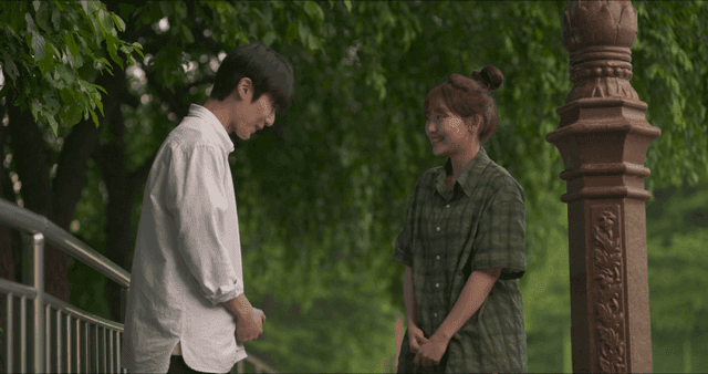 Couple having a conversation outdoors