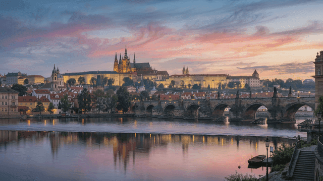 Historic cityscape with a river at sunset