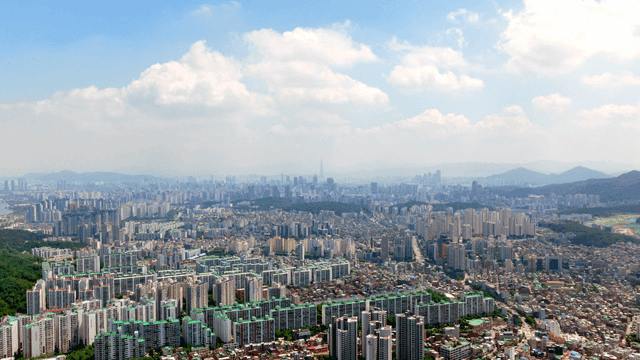 A sprawling cityscape under a clear sky