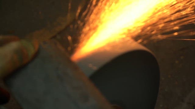 Sparks flying from a grinding wheel