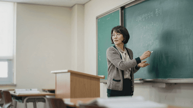 Female teacher explaining math