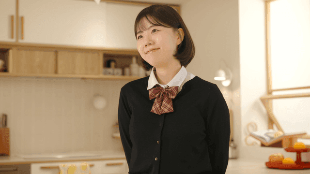 Smiling schoolgirl in cozy home