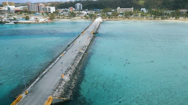 Coastal Road Built on Clear and Shallow Sea