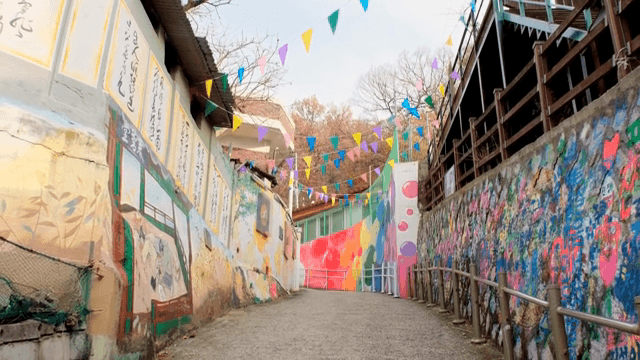 Colorful murals on alley walls