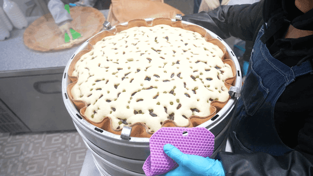 Makgeolli steamed bread stacked in layers inside steamer