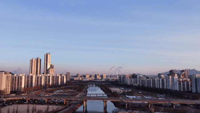 Cityscape with river and skyscrapers