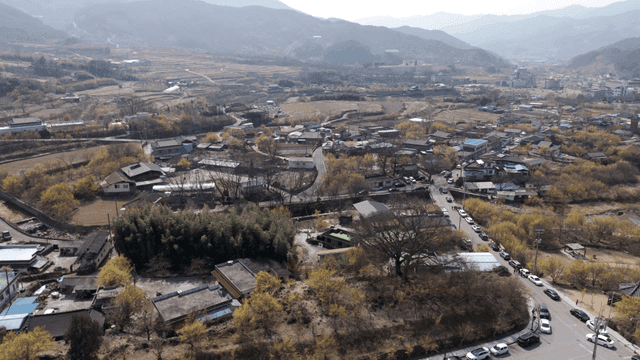 Rural village surrounded by fields