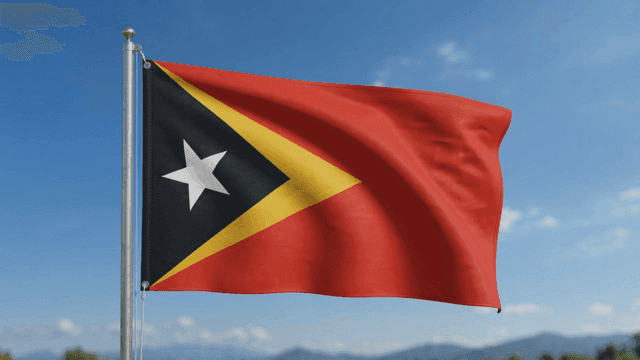 East Timor flag fluttering under clear sky
