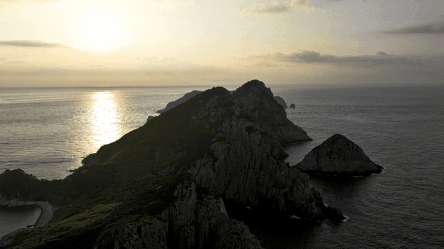 Sunset over a serene island landscape